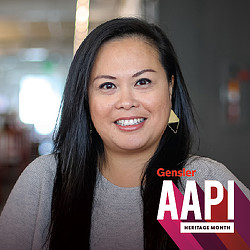 A woman smiling for the camera.