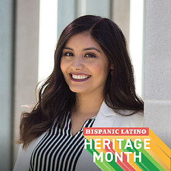 A woman smiling for the camera.