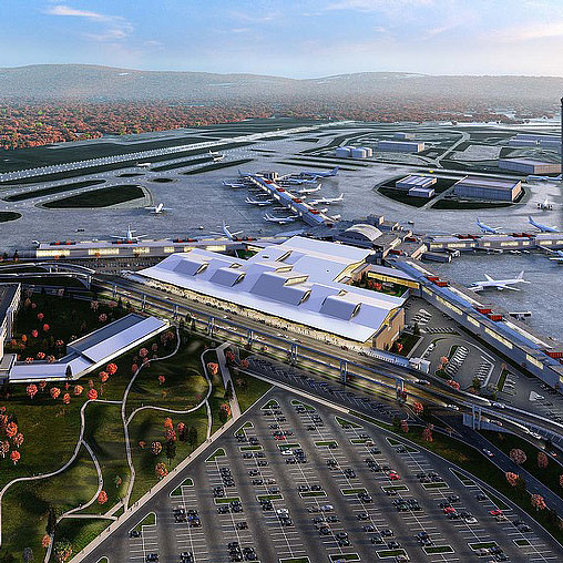 A large group of airplanes at an airport.