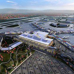 A large group of airplanes at an airport.