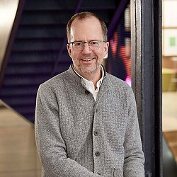 A man wearing glasses.
