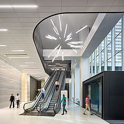 People walking up a staircase.