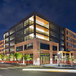 2100 Kettner building exterior at night