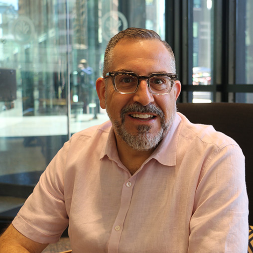 A man wearing glasses.