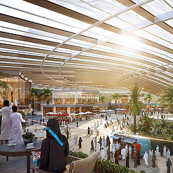 A large indoor courtyard with people and buildings.