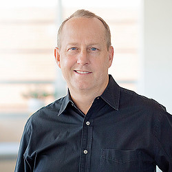 A man in a black shirt.