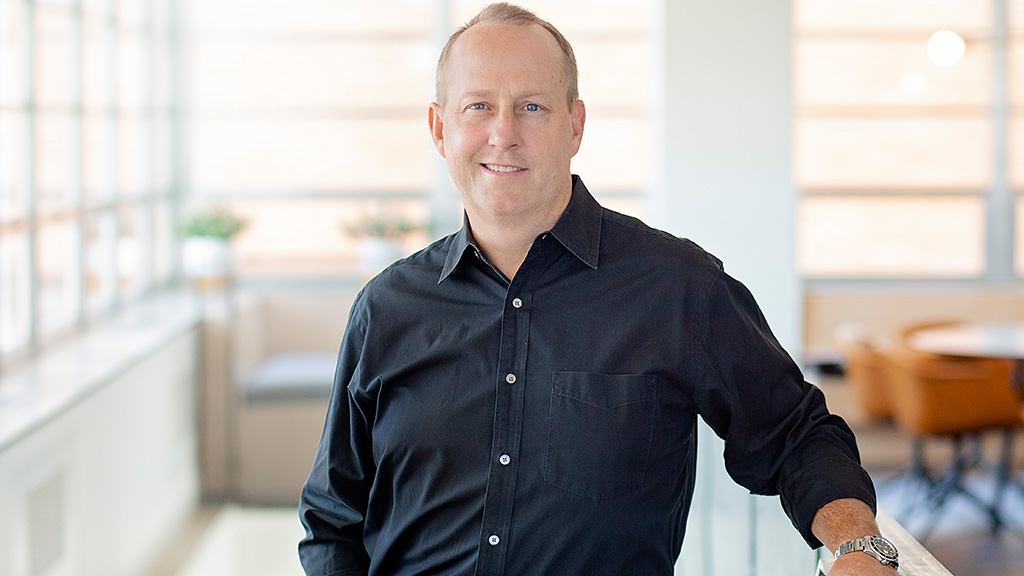 A man in a black shirt.