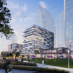 A group of people walking around a large building.