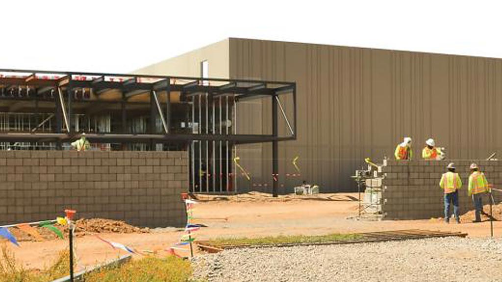 A group of workers at a construction site.