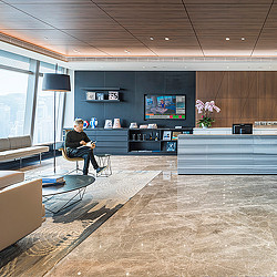 Confidential financial services client reception lounge.