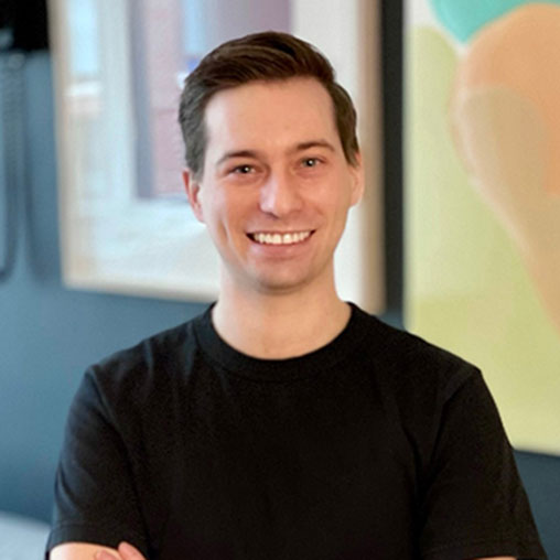 A person smiling for the camera.