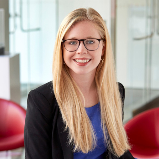 A woman wearing glasses.