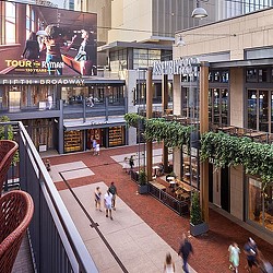 Visitors walking around Nashville Fifth + Broadway.