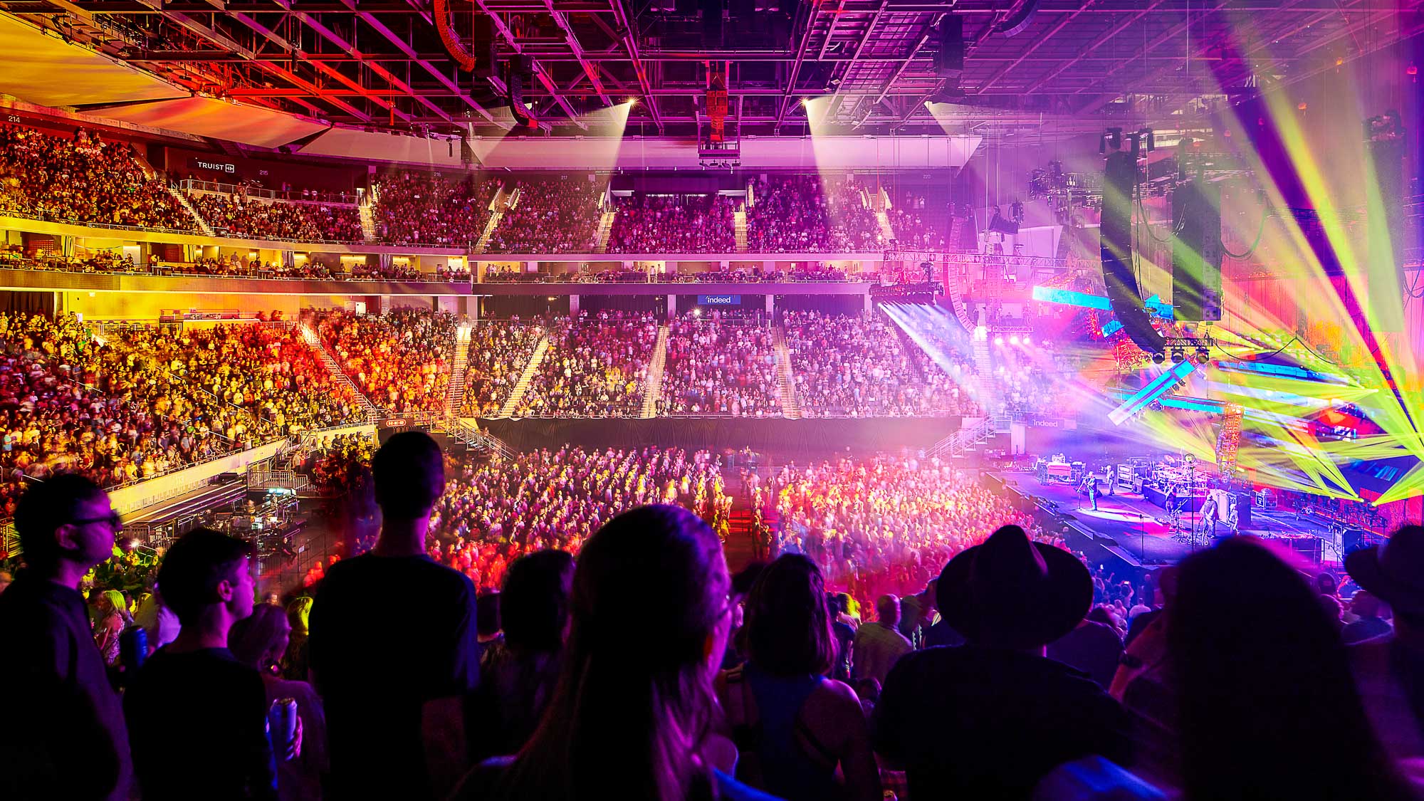 A crowd of people in a stadium.