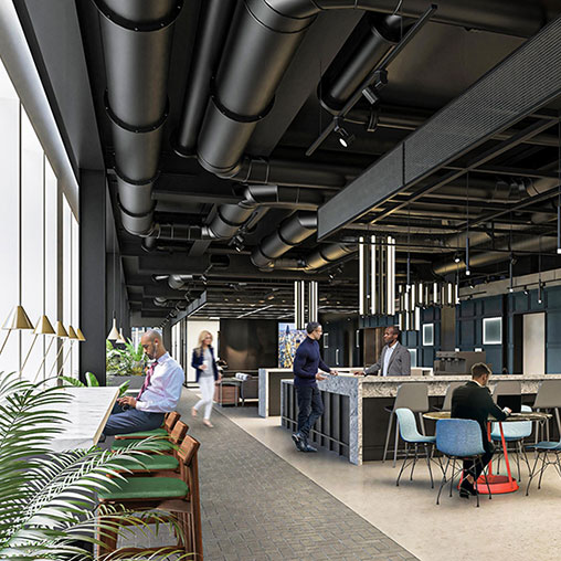 People sitting at tables in a building.
