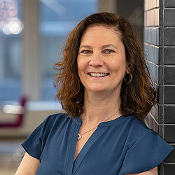 A person smiling at the camera.