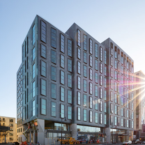 A tall building with many windows.