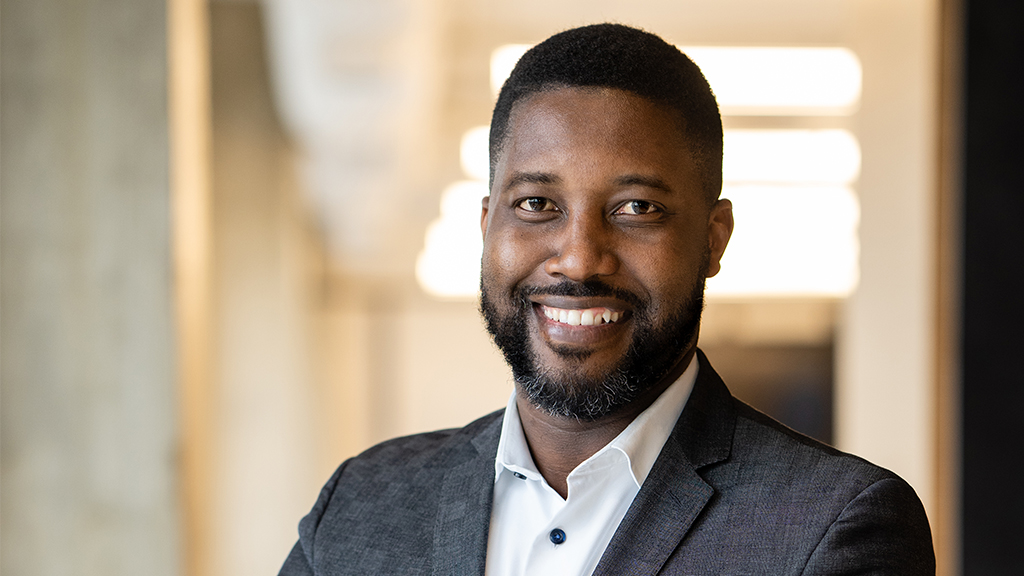 A man smiling for the camera.