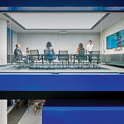 A group of people sitting at a table.