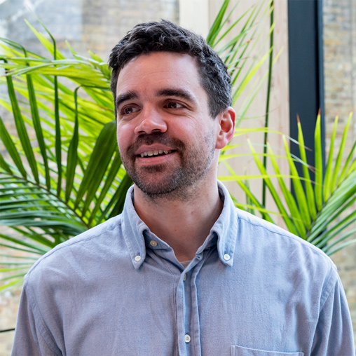 A man smiling for the camera.