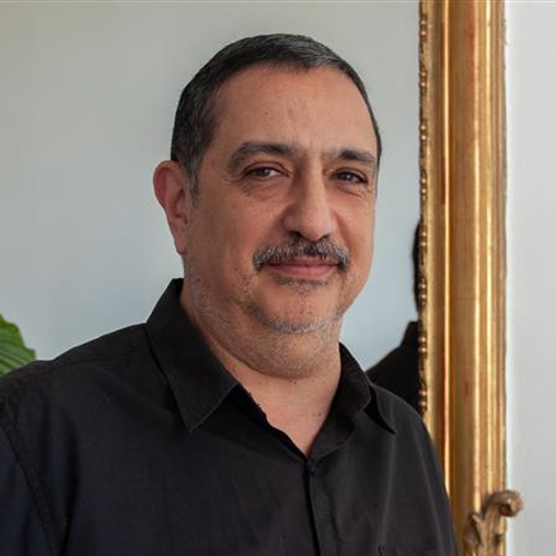 A man smiling for the camera.
