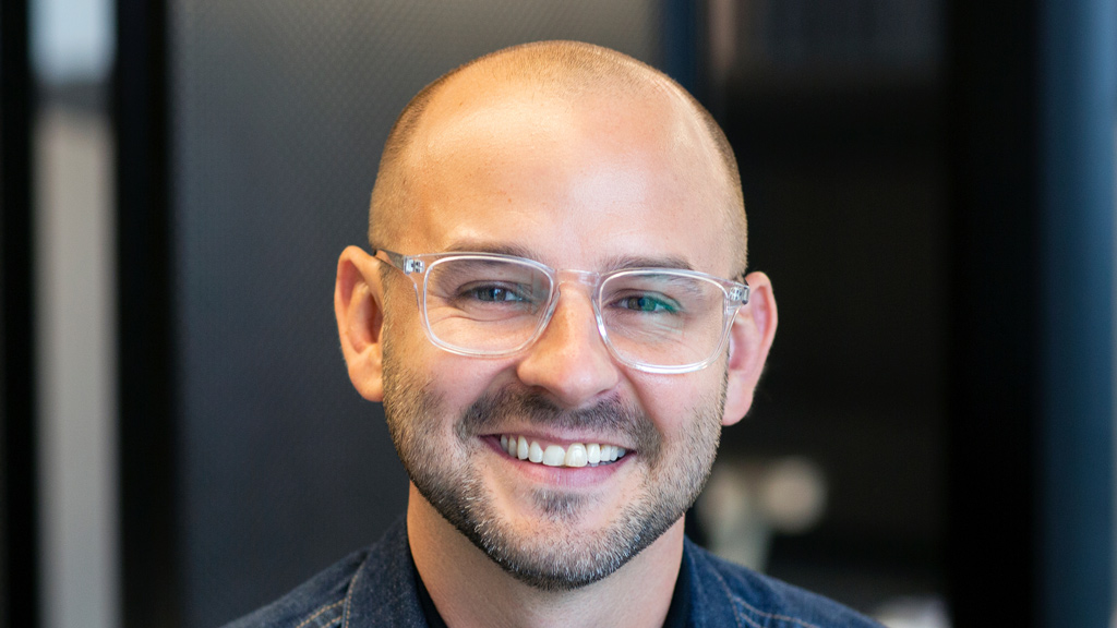 A man wearing glasses.