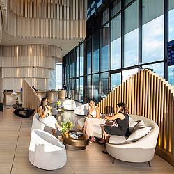 A group of women sitting in chairs.