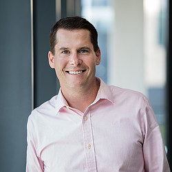 A man smiling for the camera.