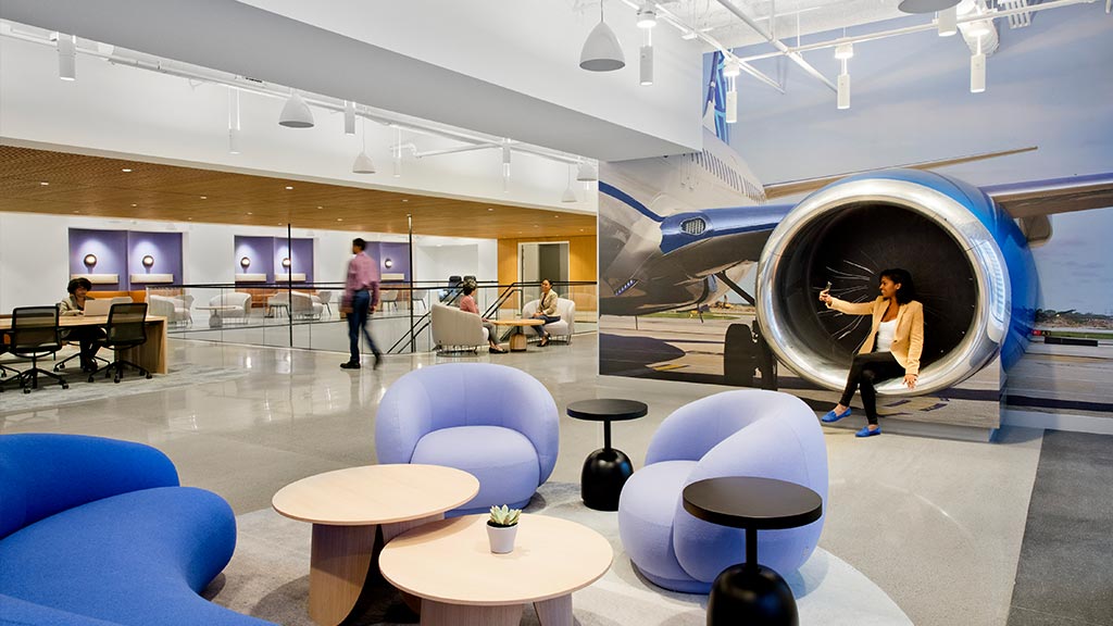 United Airlines HQ amenity space with airplane display