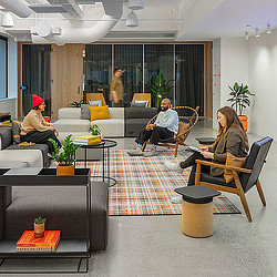 A group of people sitting in chairs.