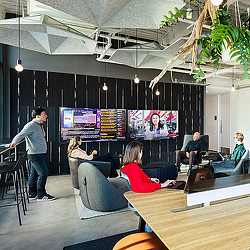 DivcoWest open meeting room with large screens