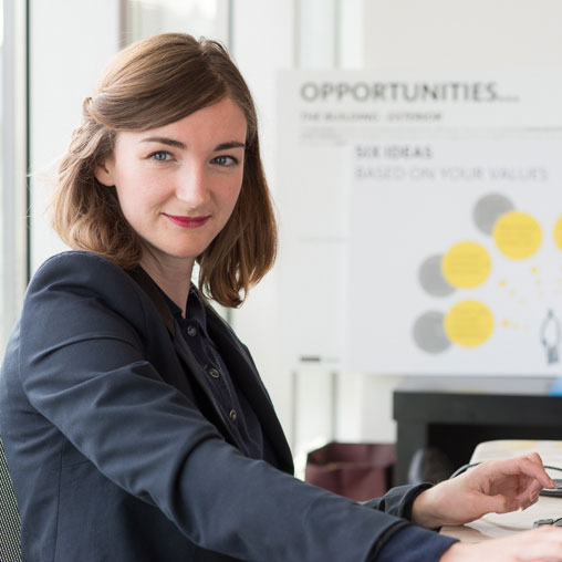 A woman in a suit.