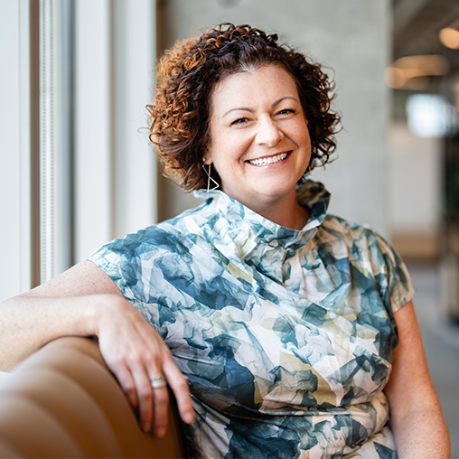 A person with curly hair.