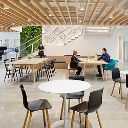 A group of people sitting at tables.