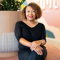 A person sitting on a couch.