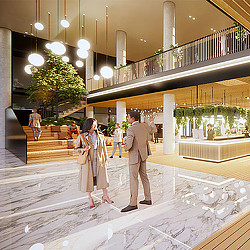 A man and woman walking down a hall with a large group of people.