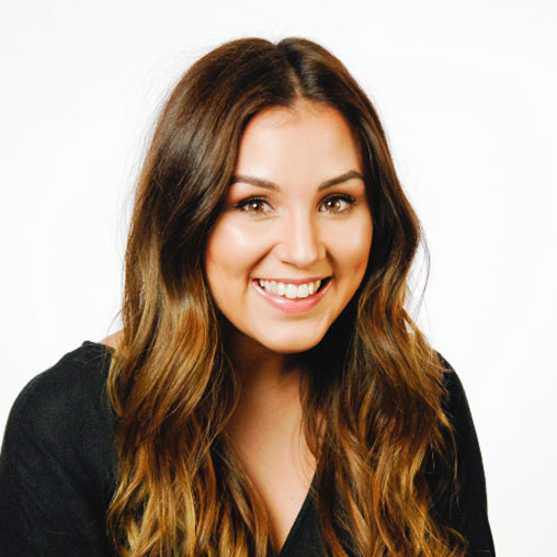 A close-up of a person smiling.