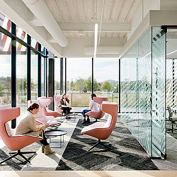 Shaw Create Centre lounge seating and meeting room with view