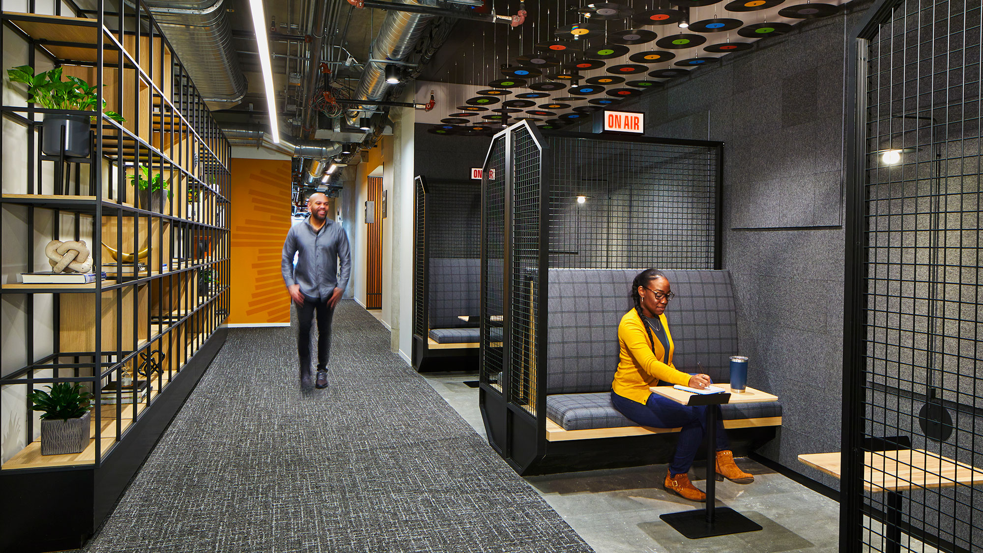 A man and woman in a server room.