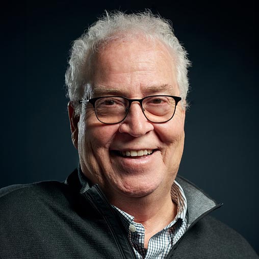 A man wearing glasses.