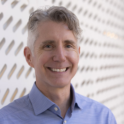 A man smiling for the camera.
