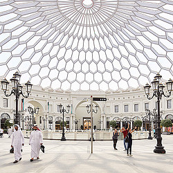 A large building with a glass roof.