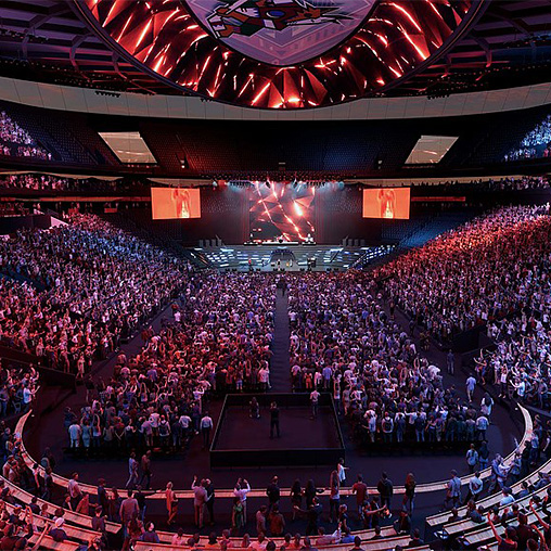 A large crowd of people in a stadium.