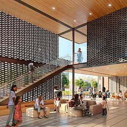 People walking around a building.