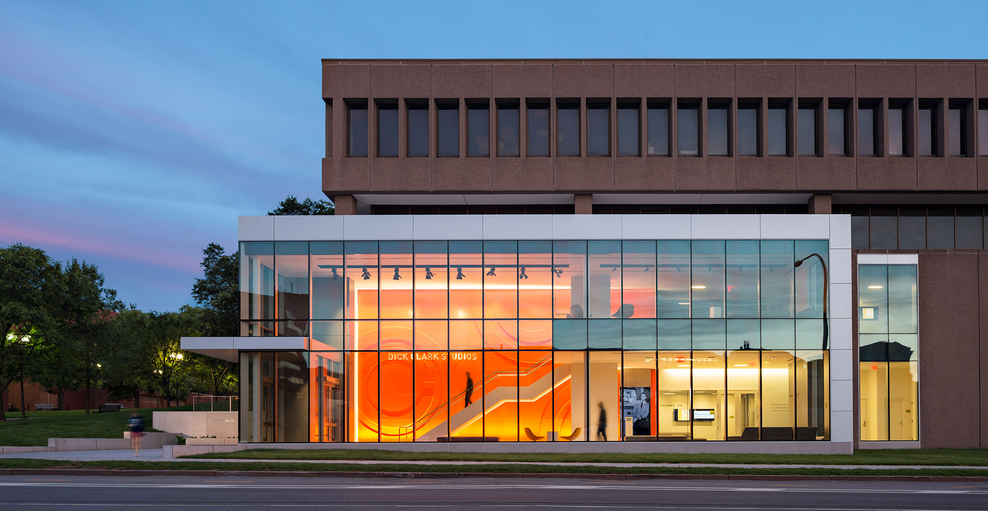 A building with a glass front.