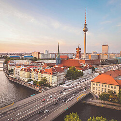 A city with a river and a bridge.