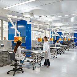 A few women in a room.