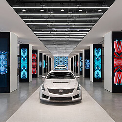 Cadillac House car display with digital screens