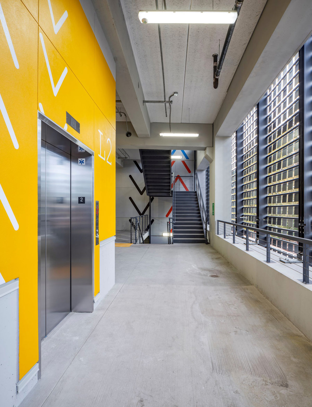 A hallway with yellow walls.