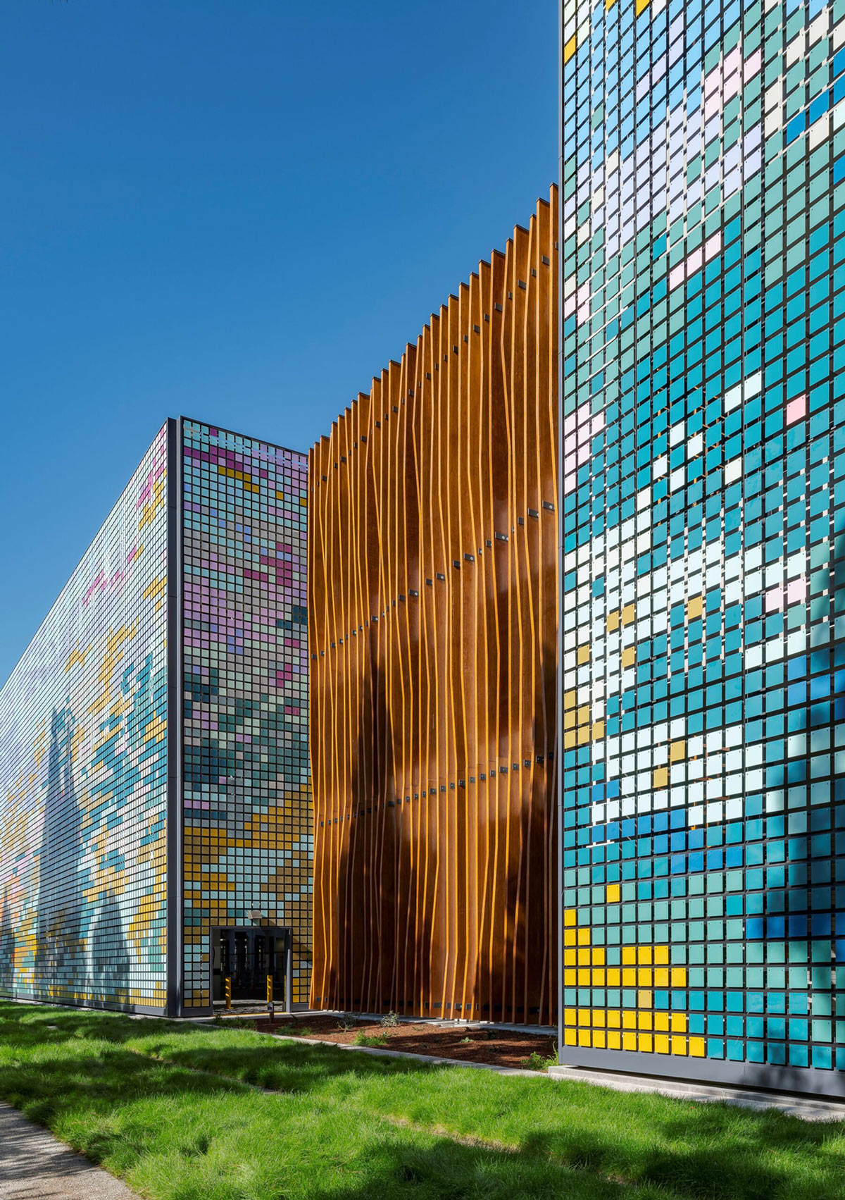 A building with colorful glass walls.